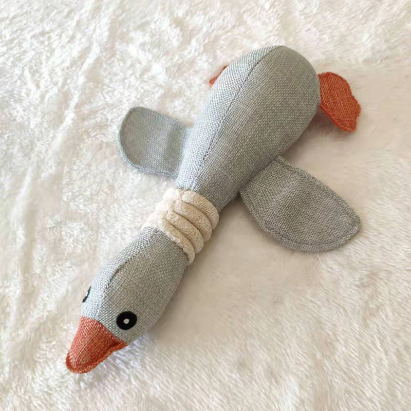 PATO GRIS DE PELUCHE CON SONIDO 31CMS